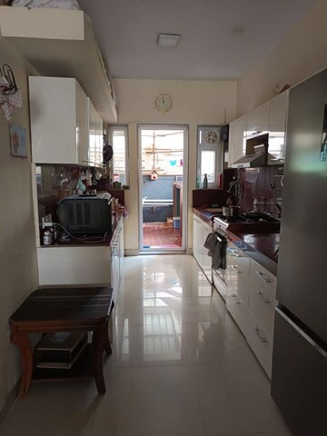 Kitchen in 3 BHK Penthouse at G K Roseland Residency, Pimple Saudagar – for Sale