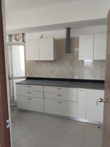 Kitchen in 3 BHK Apartment at Jaypee Kalypso Court, Sector 128 – for Sale