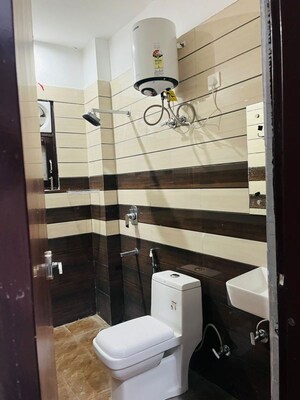 Bathroom in 3 BHK Builder Floor at Sushant Lok I – for Rent