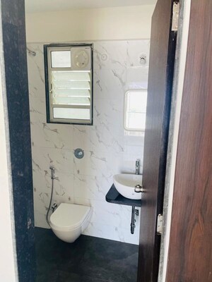Bathroom in 2 BHK Apartment at Basil Mondale, Mundhwa – for Rent