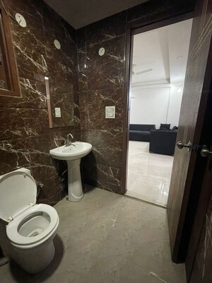Bathroom in 1.5 BHK Builder Floor at Chattarpur – for Rent