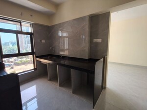 Kitchen in 1.5 BHK Apartment at Datta Pada – for Rent