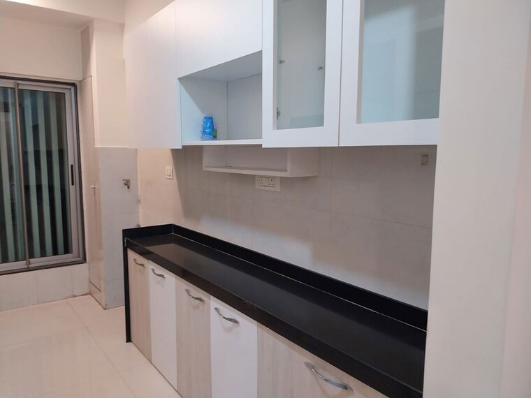 Kitchen, arkade-earth-bluebell 2 Bedroom 670 Sq.Ft. Apartment In Kanjurmarg East Mumbai 10073614