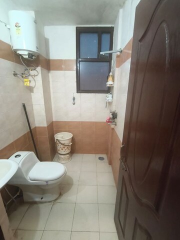 Bathroom in 2 BHK Apartment at Dhakoli – for Sale