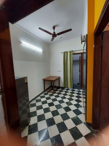 Bedroom in 1.5 BHK Builder Floor at Arun Yamuna Enclave, Sector 30 – for Rent