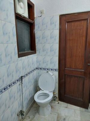 Bathroom in 1.5 BHK Builder Floor at Arun Yamuna Enclave, Sector 30 – for Rent