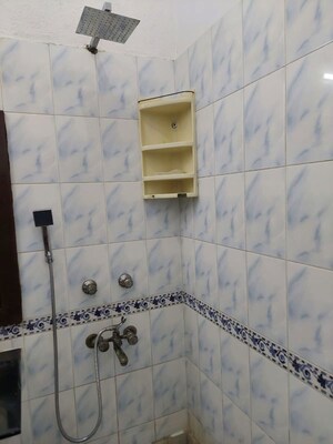 Bathroom in 1.5 BHK Builder Floor at Arun Yamuna Enclave, Sector 30 – for Rent