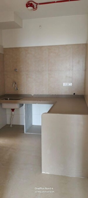 Kitchen in 2 BHK Apartment at Dosti West County, Balkum Pada – for Rent