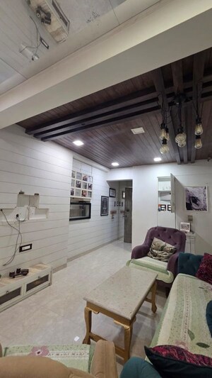 Living Room in 2 BHK Apartment at Lokhandwala Complex – for Rent