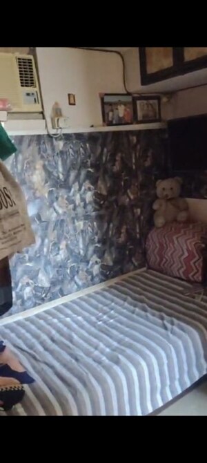 Bedroom in 1 BHK Apartment at Morarjee Mill Compound, Kandivali East – for Sale