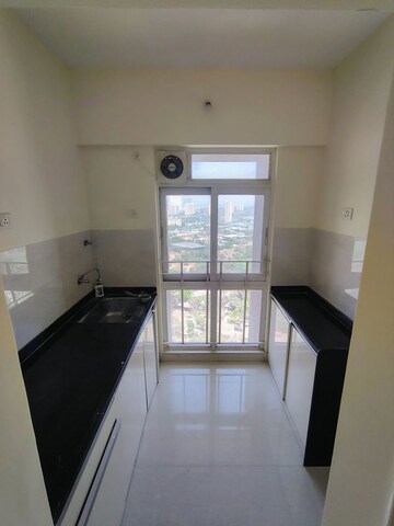 Kitchen in 1 BHK Apartment at Vijay Orovia, Ghodbunder Road – for Rent