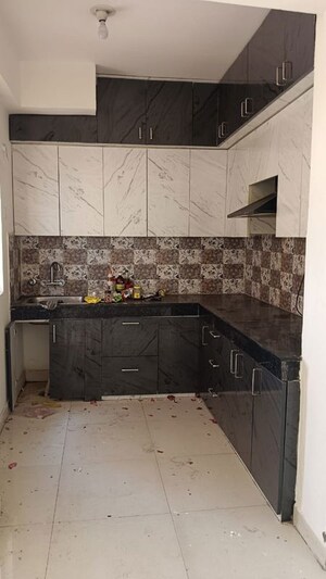 Kitchen in 1.5 BHK Apartment at Signature Global Synera, Sector 81 – for Rent