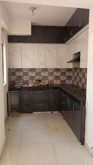 Kitchen in 1.5 BHK Apartment at Signature Global Synera, Sector 81 – for Rent