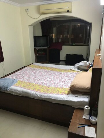 Bedroom in 2 BHK Apartment at Seagull Apartment, Tardeo – for Rent