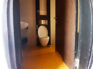 Bathroom in 4 BHK Apartment at Lodha Luxuria, Majiwada – for Rent