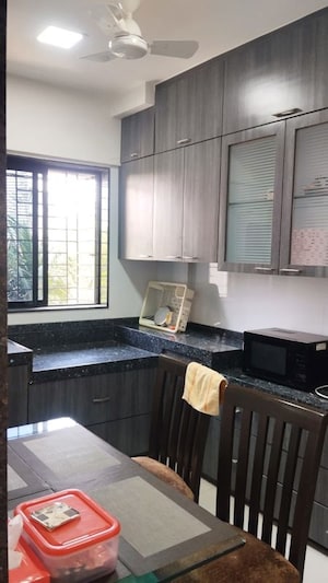 Kitchen in 1 BHK Apartment at Juhu Abhishek Chs Ltd, Andheri West – for Sale
