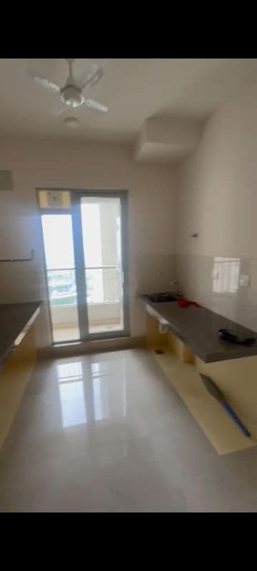 Kitchen in 2 BHK Apartment at Piramal Vaikunth Vama, Balkum Pada – for Rent