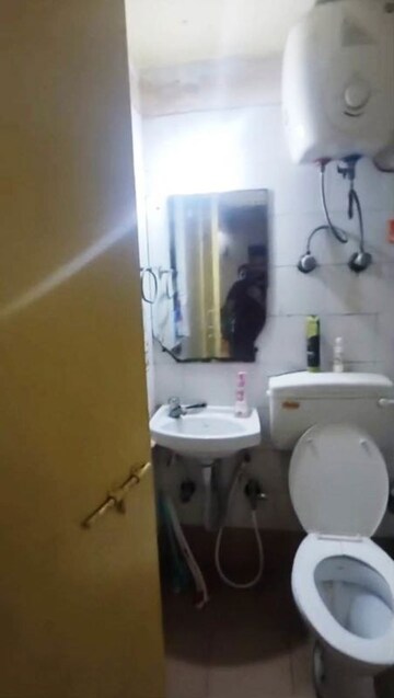Bathroom in 2 BHK Apartment at Ambuja Upohar The Condoville, Em Bypass – for Rent