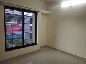 Room in 2 BHK Apartment at Kharadi – for Rent