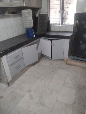 Kitchen in 2 BHK Apartment at Arun Vihar Sector 37, Sector 37 – for Rent