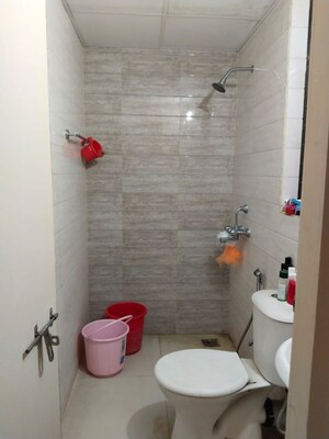 Bathroom in 1 BHK Apartment at Ambuja Utalika : The Condoville, Em Bypass – for Rent