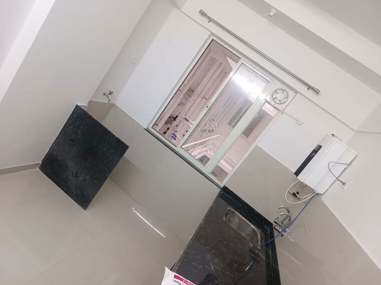 Kitchen/pantry, triaa-kosmic-kourtyard 2 Bedroom 850 Sq.Ft. Apartment In Wagholi Pune 10074558