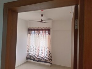 Room in 2 BHK Apartment at Triaa Kosmic Kourtyard, Wagholi – for Rent