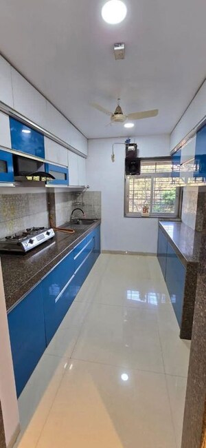 Kitchen in 3 BHK Apartment at Cosmos Horizon, Thane West – for Rent