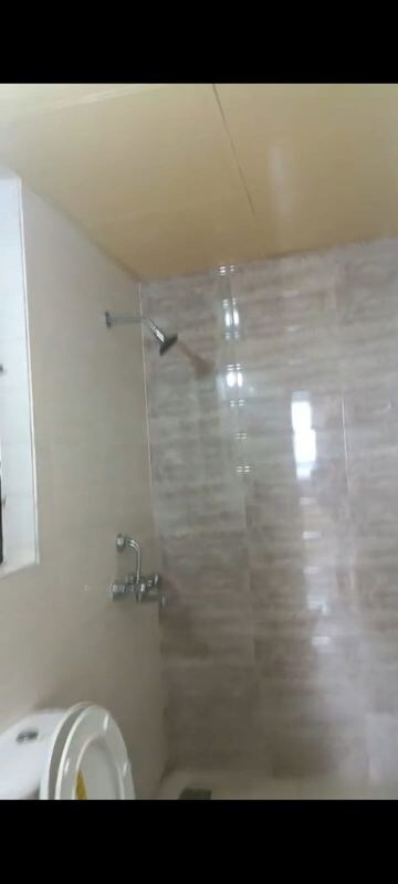 Bathroom in 1 BHK Apartment at Ambuja Utalika : The Condoville, Em Bypass – for Rent