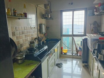 Kitchen in 2 BHK Apartment at Atul Blue Orbit, Malad West – for Sale