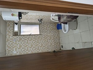 Kitchen in 2.5 BHK Apartment at Nimbus The Golden Palm, Sector 168 – for Rent