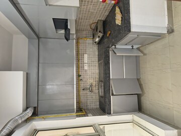 Kitchen in 2.5 BHK Apartment at Nimbus The Golden Palm, Sector 168 – for Rent