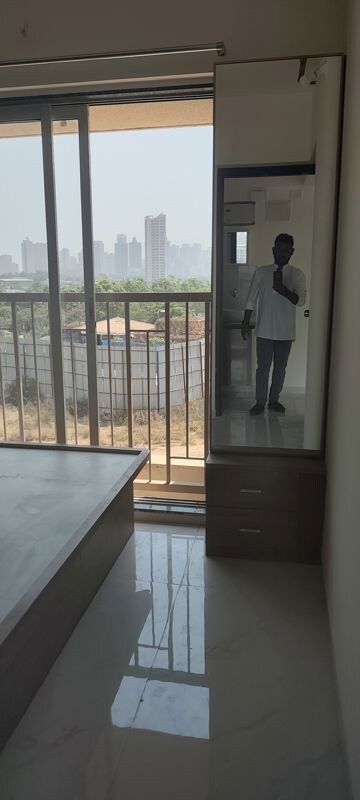 Balcony in 1 BHK Apartment at Metropolis Bayside, Kasarvadavali – for Rent