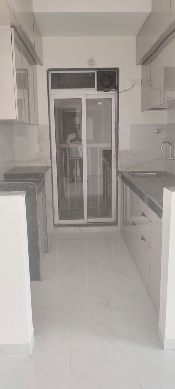 Kitchen in 1 BHK Apartment at Metropolis Bayside, Kasarvadavali – for Rent