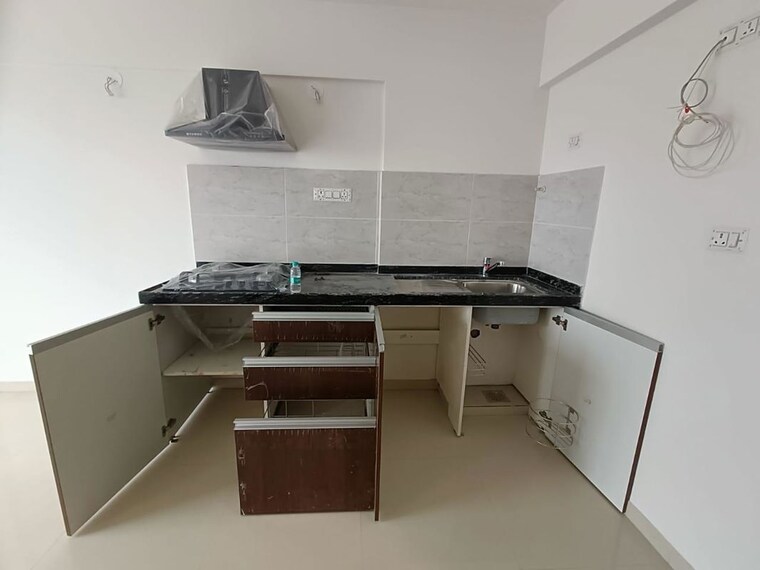 Kitchen, geras-world-of-joy-l Studio 250 Sq.Ft. Apartment In Kharadi Pune 10074830