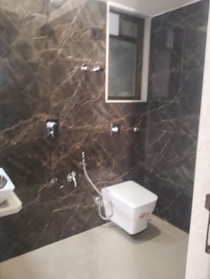 Bathroom in 2 BHK Apartment at Raj Heritage 1, Mira Road – for Rent