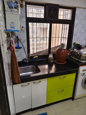 Kitchen in 2 BHK Apartment at Om Sai Plaza, Ghodbunder Road – for Rent