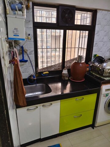 Kitchen in 2 BHK Apartment at Om Sai Plaza, Ghodbunder Road – for Rent