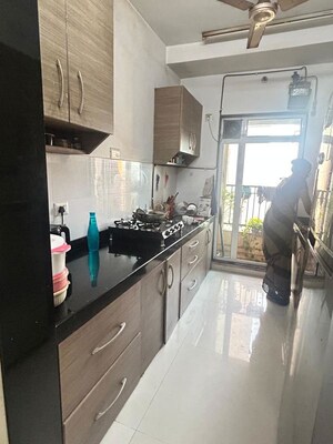 Kitchen in 2 BHK Apartment at Rustomjee Urbania Azziano, Thane West – for Rent