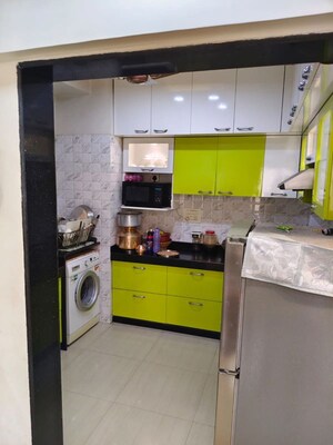 Kitchen in 4 BHK Apartment at Hiranandani Rodas Enclave Leona, Ghodbunder Road – for Rent