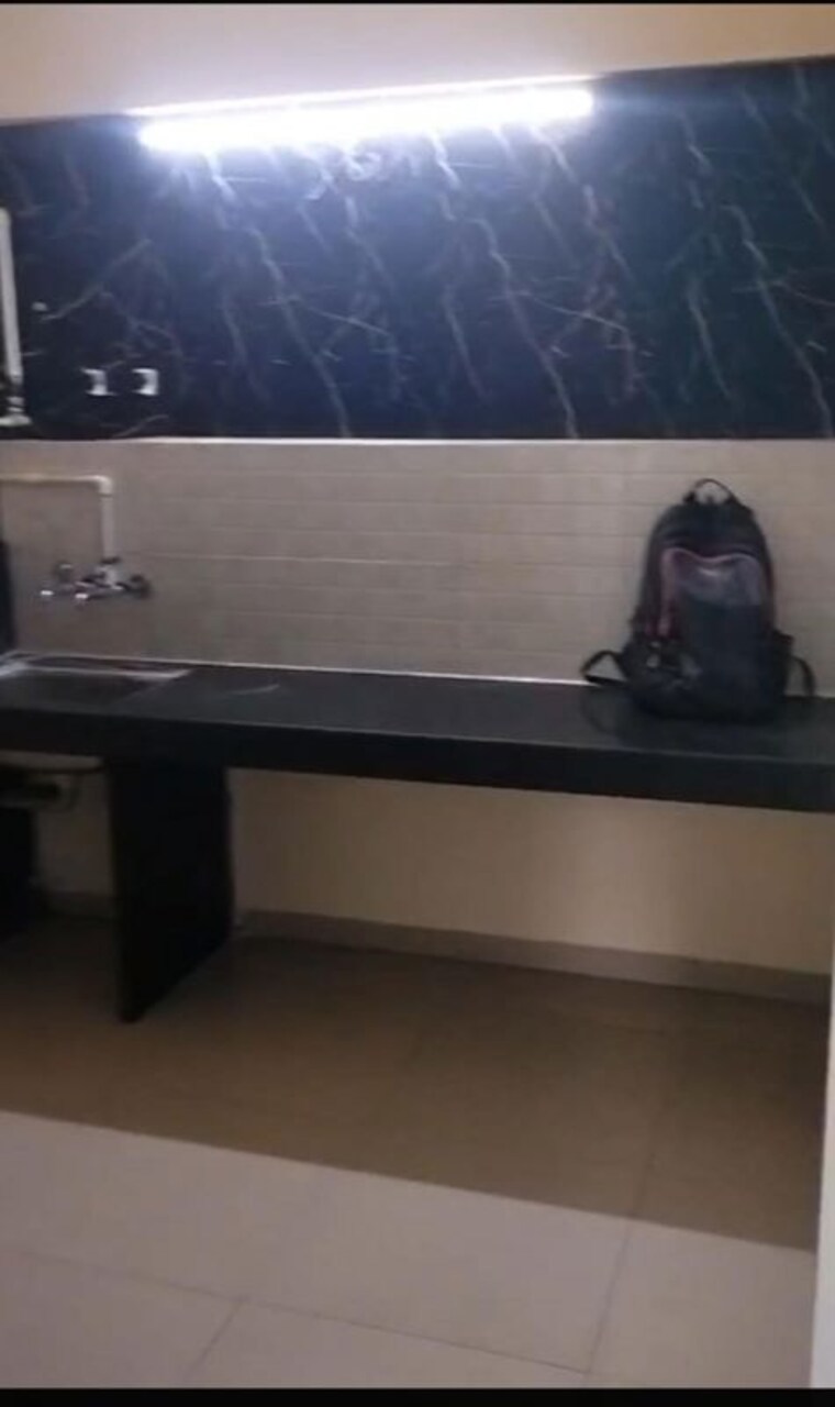 Kitchen, pristine-neo-city-phase-2 2 Bedroom 810 Sq.Ft. Apartment In Wagholi Pune 10074941