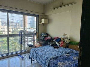 Bedroom in 2 BHK Apartment at Atul Blue Orbit, Malad West – for Sale