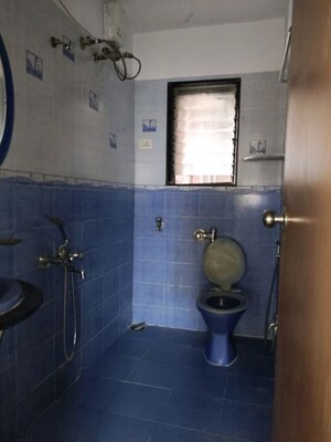 Bathroom in 3 BHK Apartment at Lokhandwala Whispering Palms, Kandivali East – for Rent