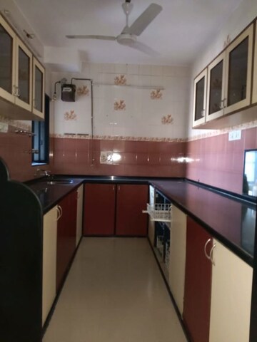 Kitchen in 3 BHK Apartment at Lokhandwala Whispering Palms, Kandivali East – for Rent