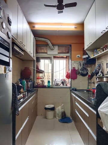 Kitchen in 2.5 BHK Apartment at Dosti Florentine, Wadala – for Sale