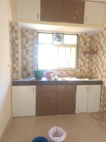 Kitchen in 2 BHK Apartment at MAAD Nakoda Heights, Nalasopara West – for Rent