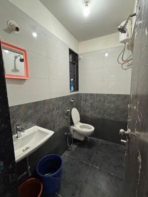 Bathroom in 1 BHK Apartment at Jyoti Complex, Goregaon East – for Rent