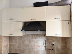 Kitchen in 2.5 BHK Apartment at Ramprastha Awho, Sector 95 – for Sale