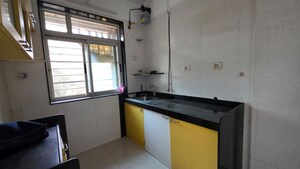 Kitchen in 2 BHK Apartment at Vasant Fiona, Pokhran Road No Two – for Rent