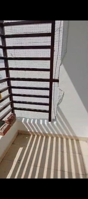 Staircase in 2 BHK Apartment at Meenal Balmukund Residency, Raj Nagar Extension – for Sale